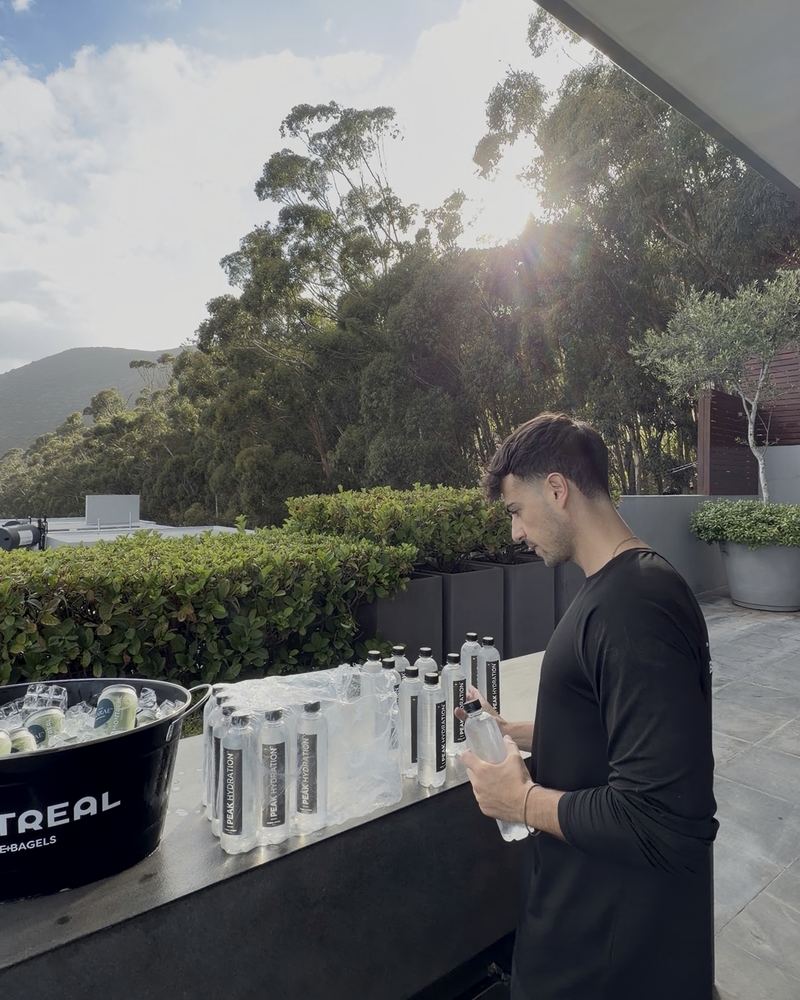 Setting up Peak Hydration at a Montreal Coffee & Bagels pop-up