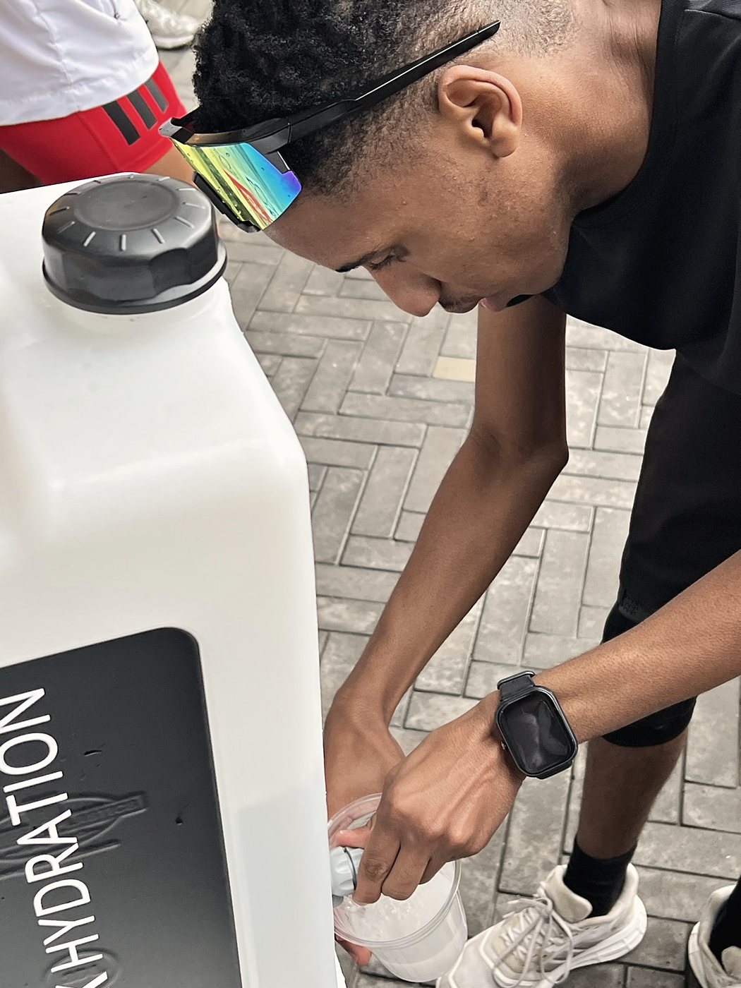 Filling up at the Peak Hydration station between sessions