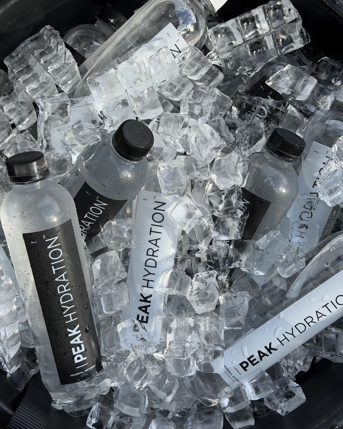 Peak Hydration bottles packed in ice